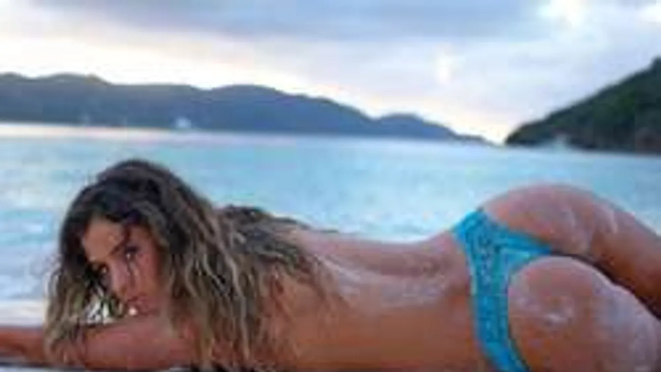 Õrjítő fenekű szörfös angyal a vízágyon - fotók