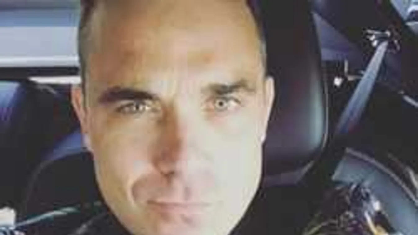 Itt az első videó Robbie Williams titkos budapesti útitársáról