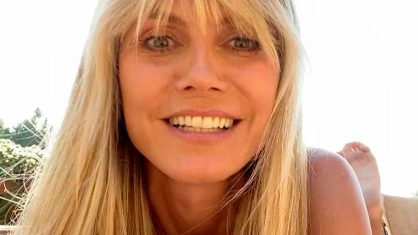 Topless locsolt a kertben a 47 éves Heidi Klum - Fotó