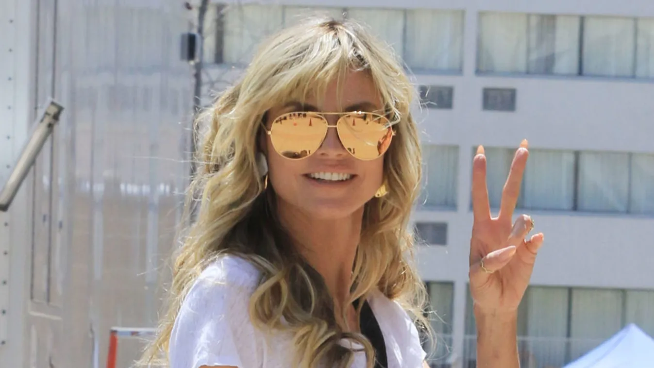 Nem bírta a hőséget, pucéran feküdt ki a kertbe Heidi Klum - Fotó