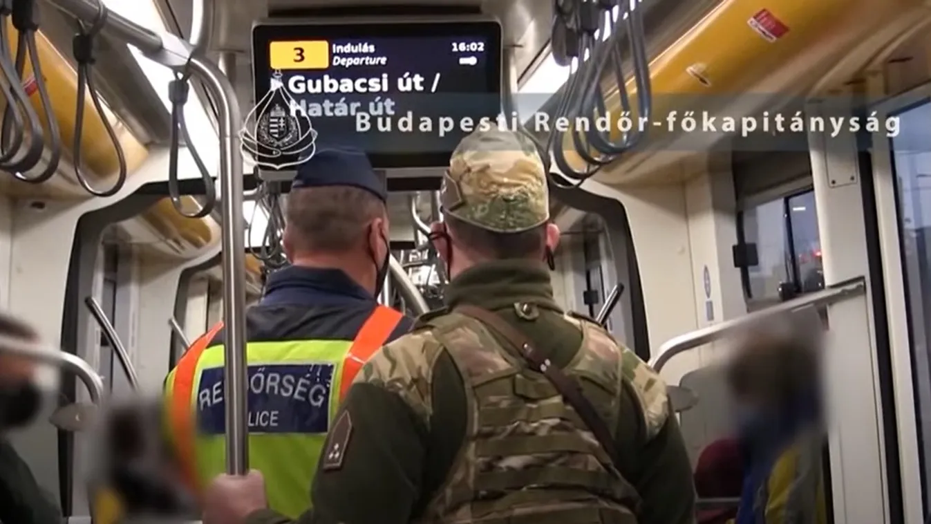 Fegyveres katonák özönlötték el a budapesti villamosokat -videó