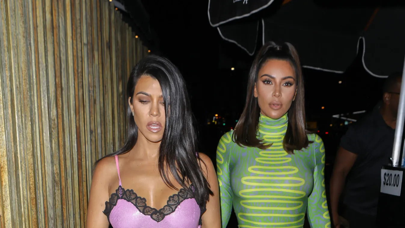Kim Kardashian in green neon at Khloe birthday joined by Kendall and Kourtney 