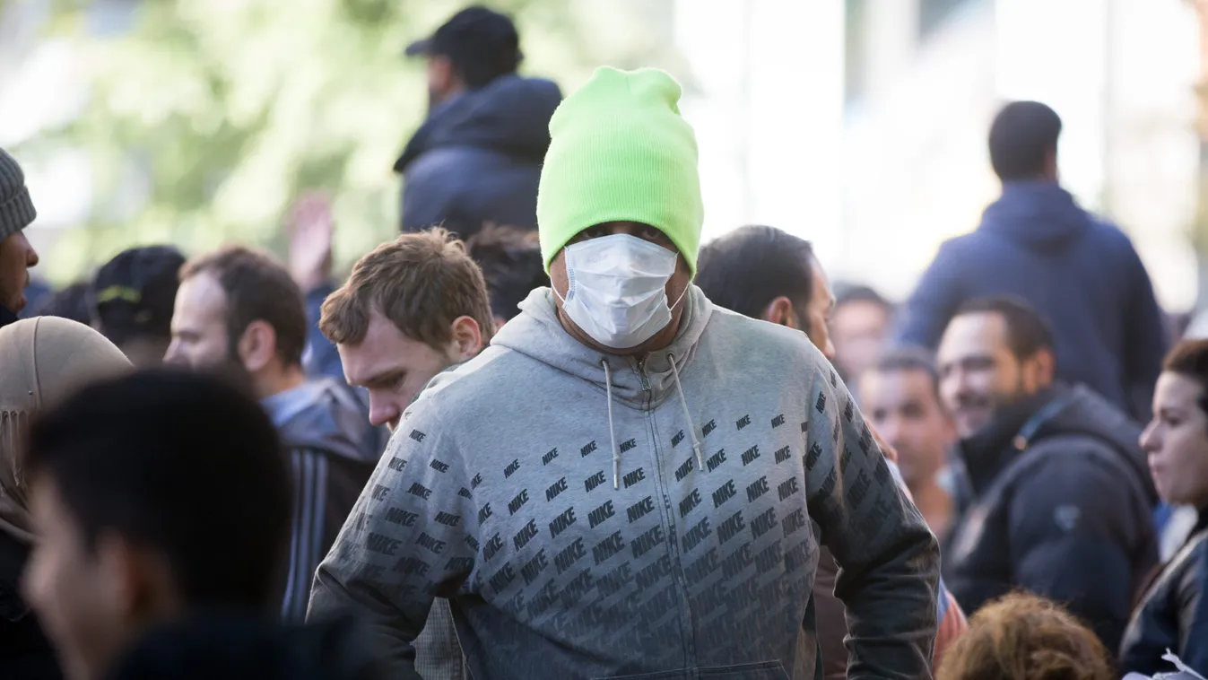 Refugees wait for their registration in Berlin