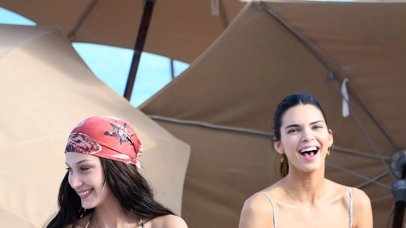 Kendall Jenner, Bella Hadid, and Kourtney Kardashian relax in bikinis as they hit the beach in Miami together