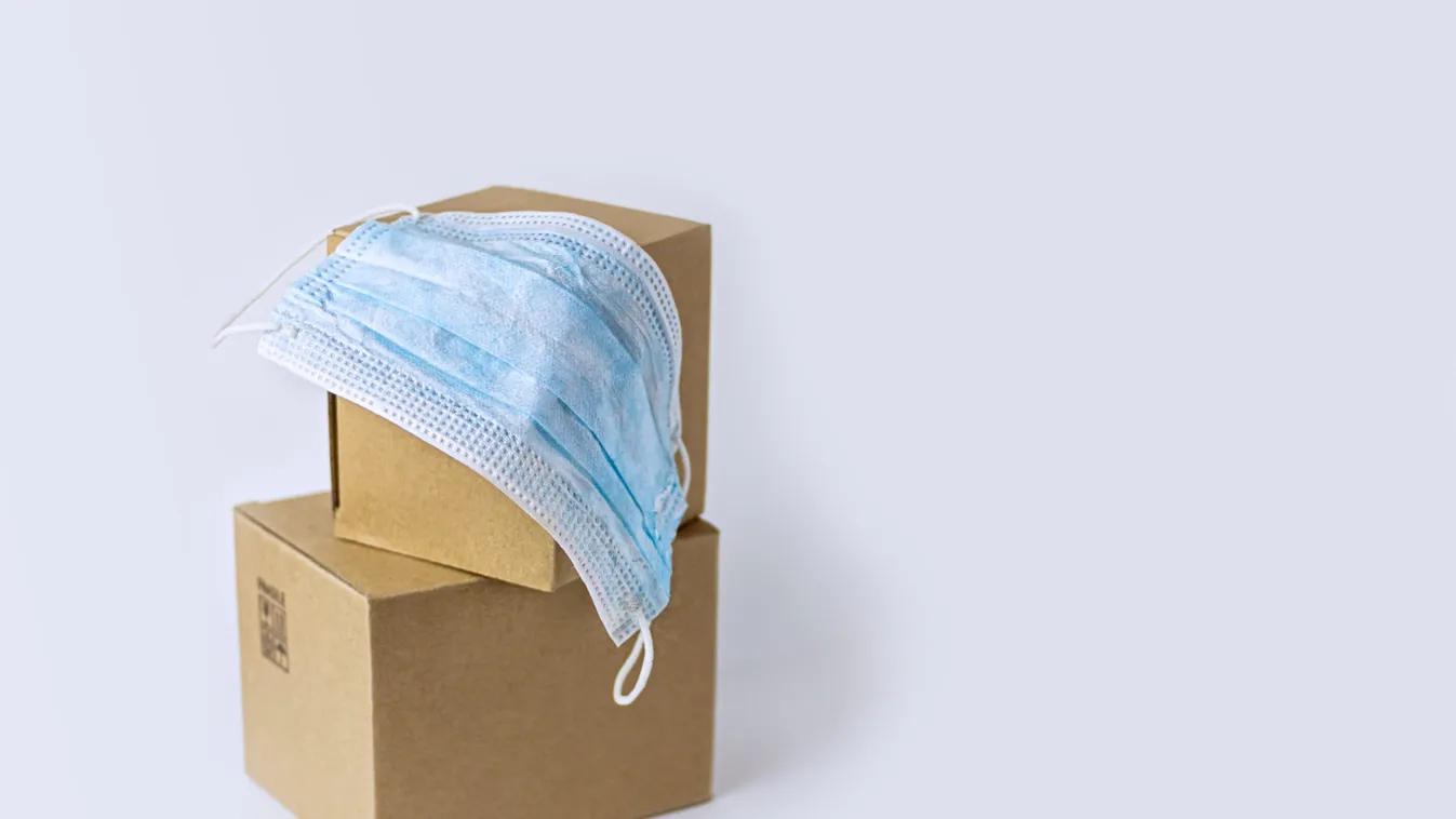 Mailboxes and medical mask. Biohazard of postal parcels. Biosafety concept.