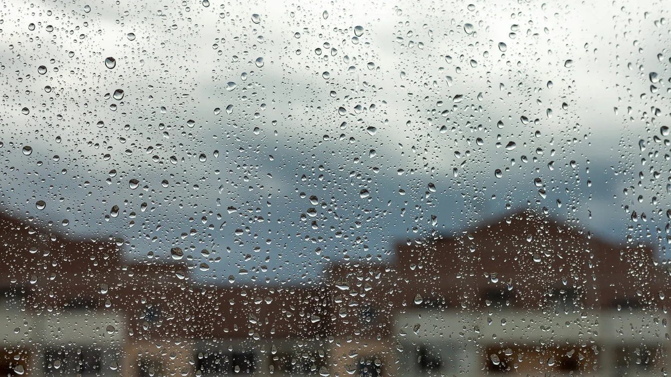Close,Up,Of,A,Window,With,Rain,Drops,Falling,Down.