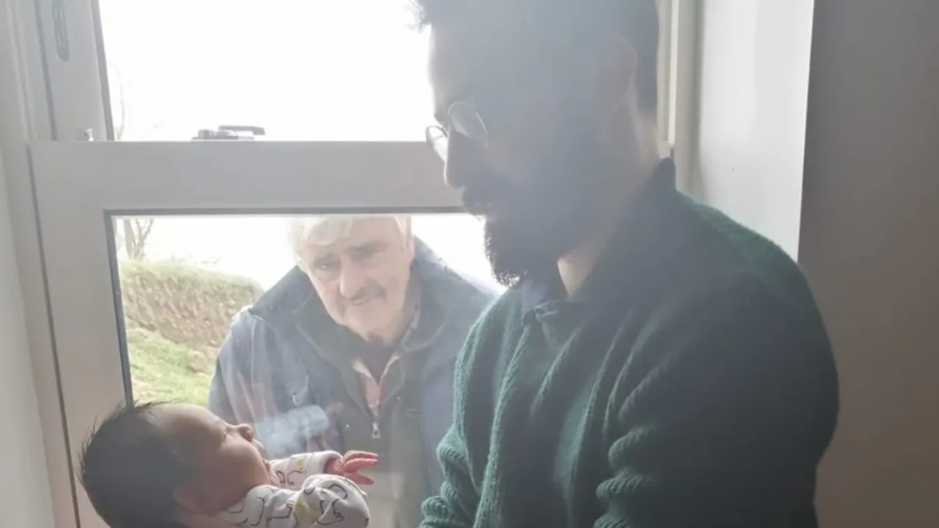 Szívszorító: a járvány miatt csak az ablakon keresztül láthatta első unokáját a nagypapa