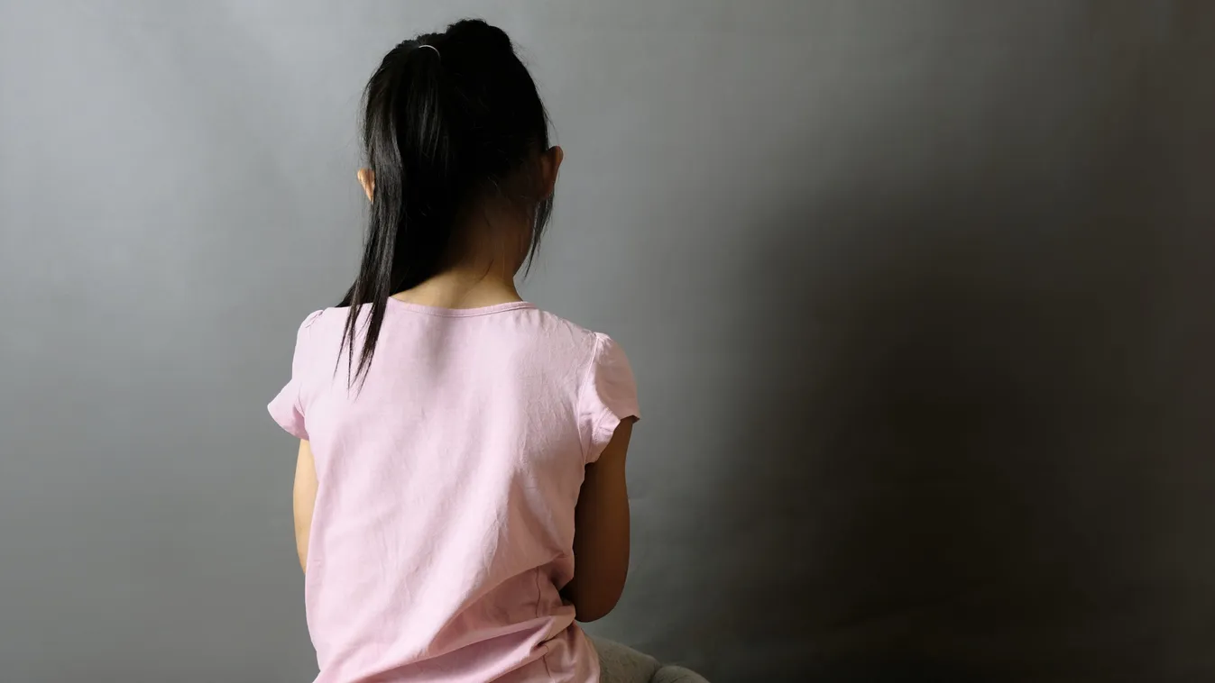 Child,Abuse,Concept.,The,Back,View,Of,An,Orphanage,Girl