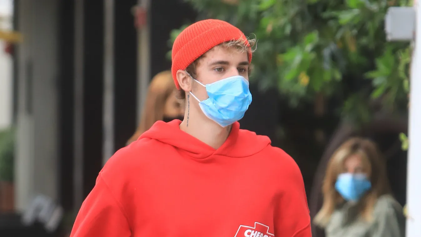 Justin Bieber in red with beanie
