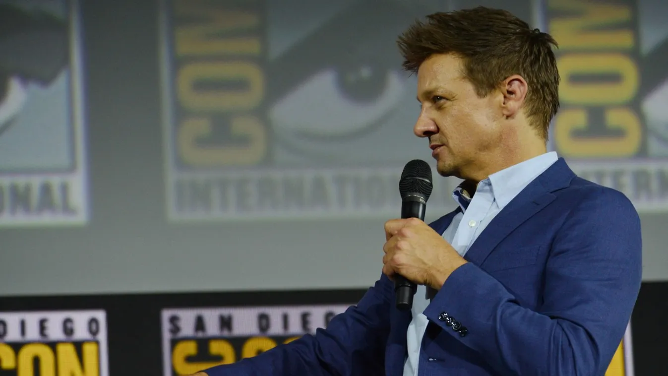 Jeremy Renner promotes Hawkeye during the Marvel Panel in Hall H for the entire upcoming slate of Marvel films during day 3 of 2019 Comic-Con in San Diego, Ca