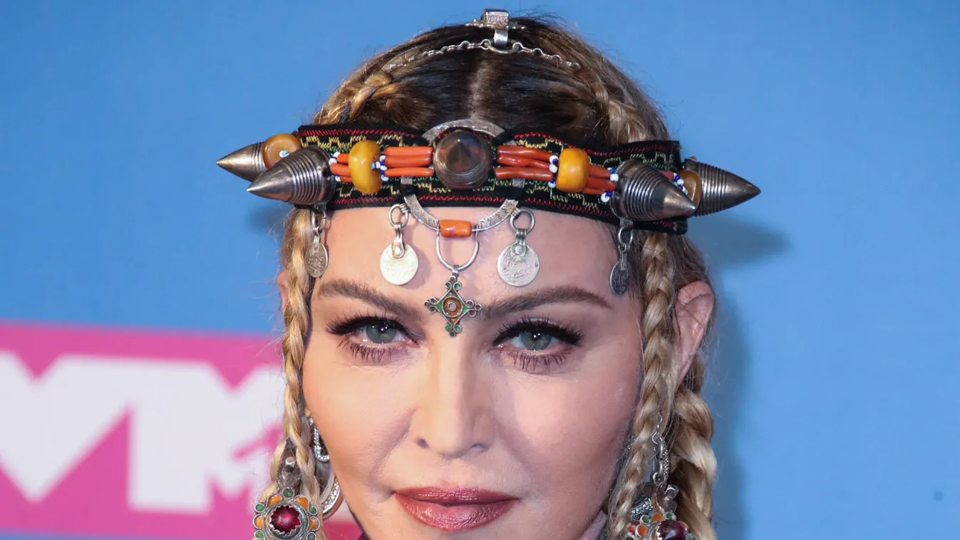 Madonna poses backstage during the 2018 MTV Video Music Awards
