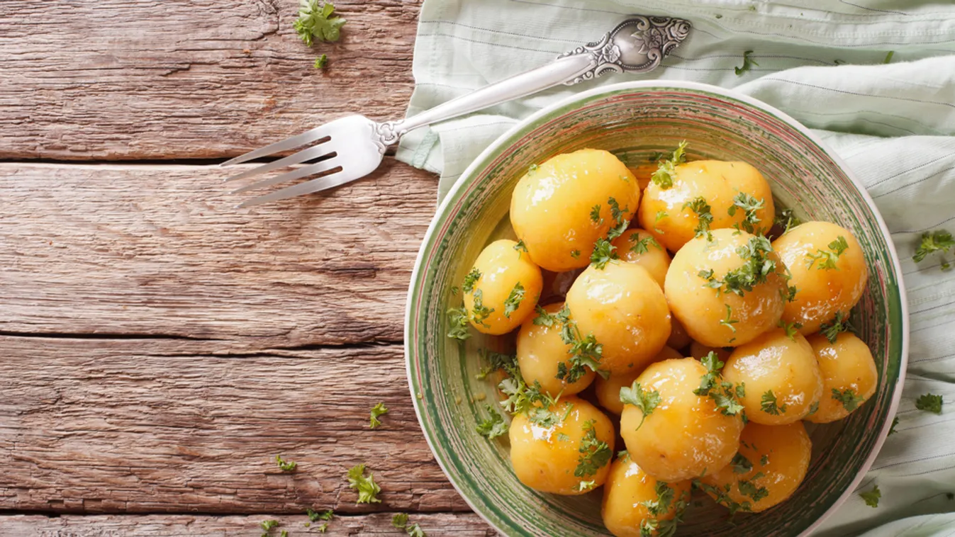 Glazed,New,Potatoes,With,Parsley,Close-up,On,The,Table.,Horizontal