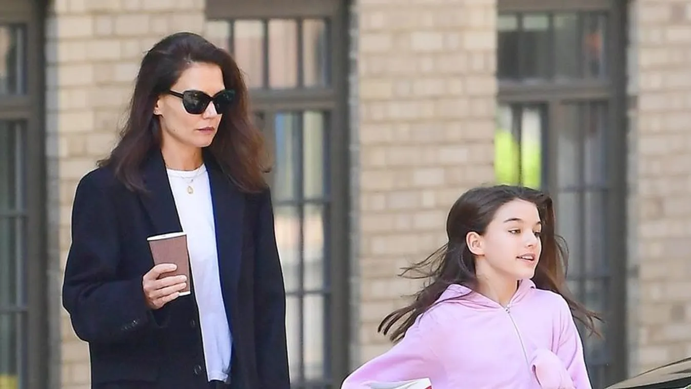 *EXCLUSIVE* Suri Cruise is a bundle of energy as she and mom Katie Holmes visit a friend in NYC