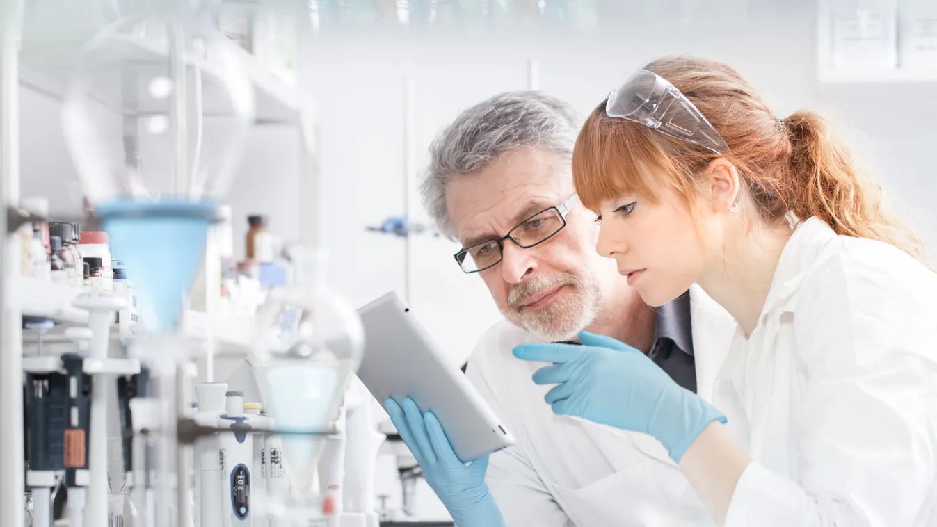 Health care researchers working in scientific laboratory.