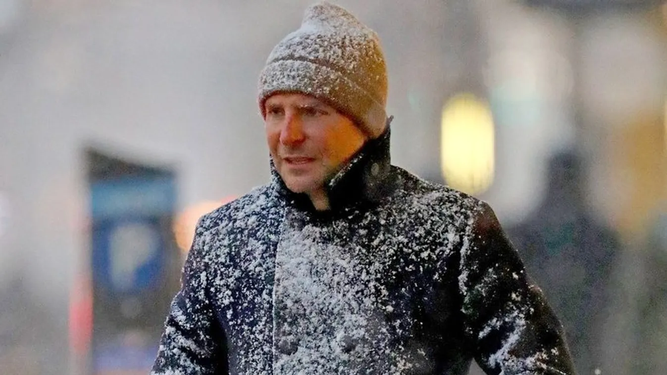 EXCLUSIVE: Bradley Cooper Gets Caught in an Intense and Sudden Snow Squall in New York City.
