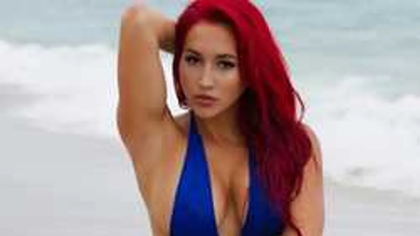 Szédületeset terpeszt a brutál mellű, piros hajú démon