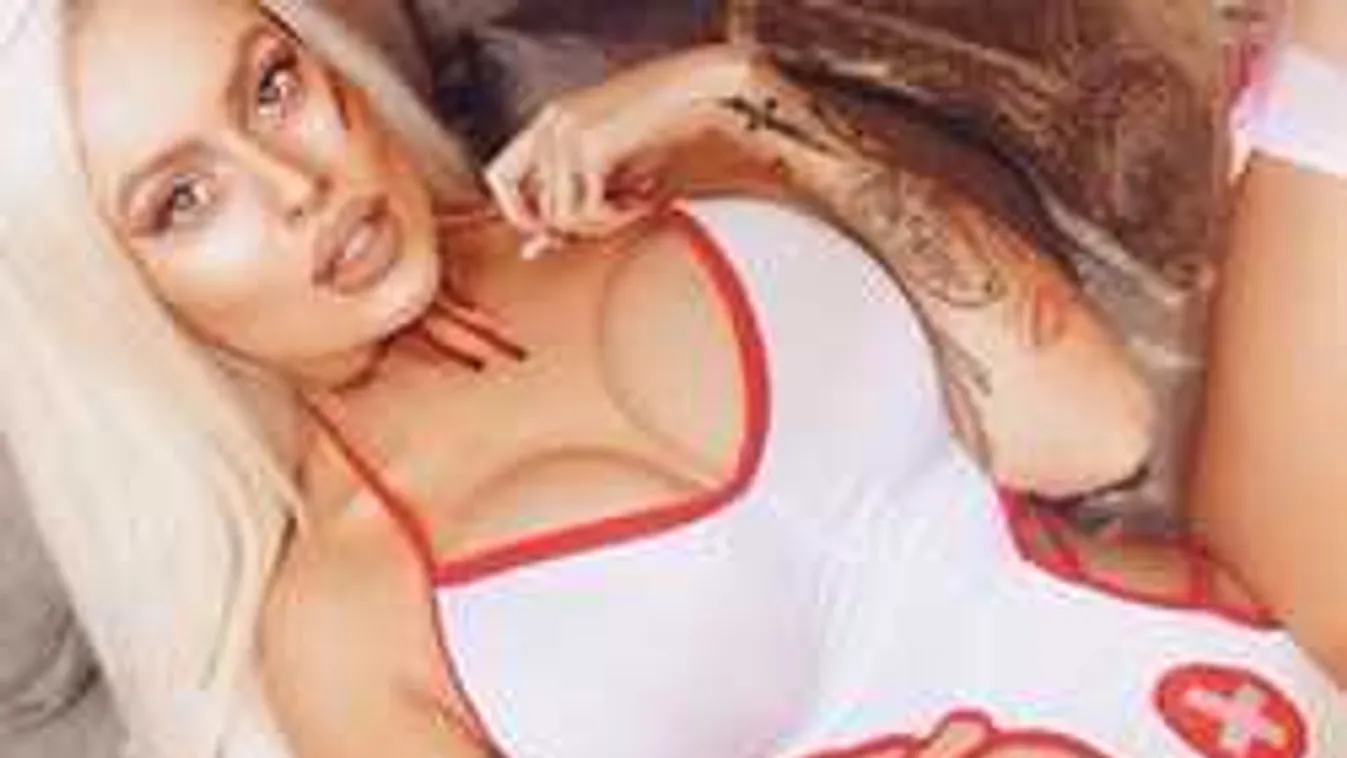 Nővérkejelmezben terpeszt a brutál mellű bombázó