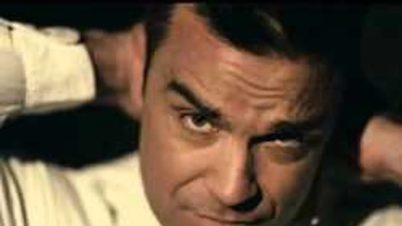 Anyaszült meztelenül pózol Robbie Williams a szoba közepén - Fotó