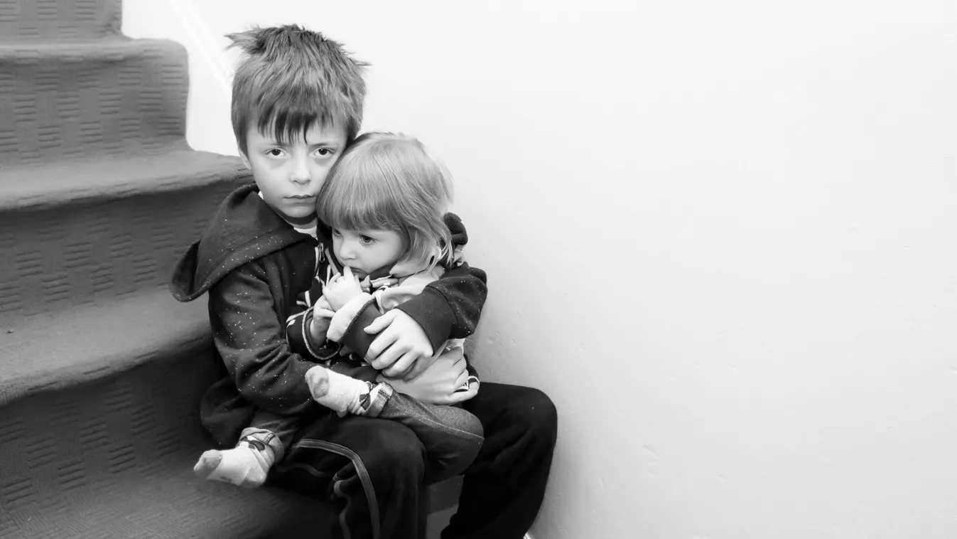 Upset,Siblings,Sitting,On,The,Stairs.