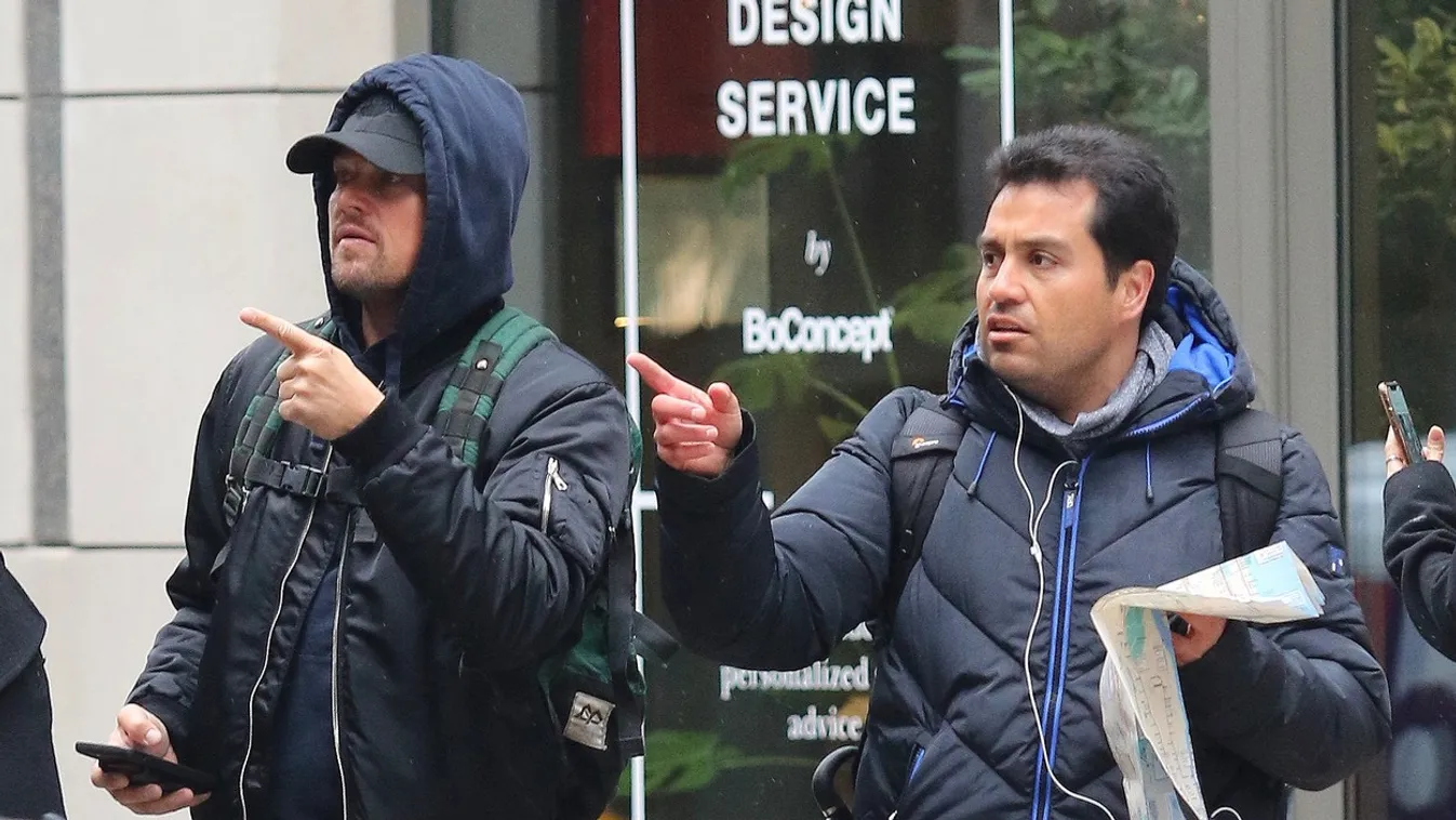Leonardo DiCaprio helps out a lost tourist with directions in NYC