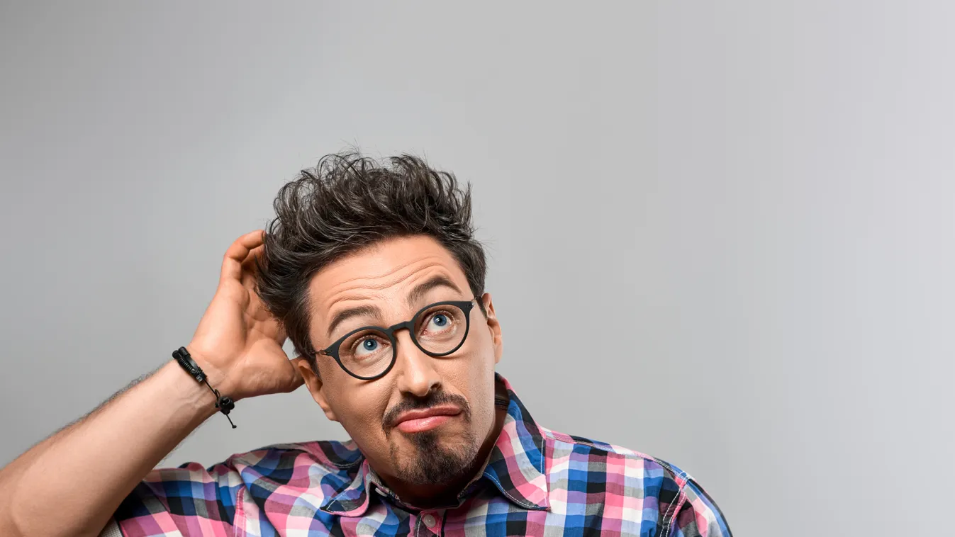 Handsome young Fashion man Thinks Idea. Crazy Nerd