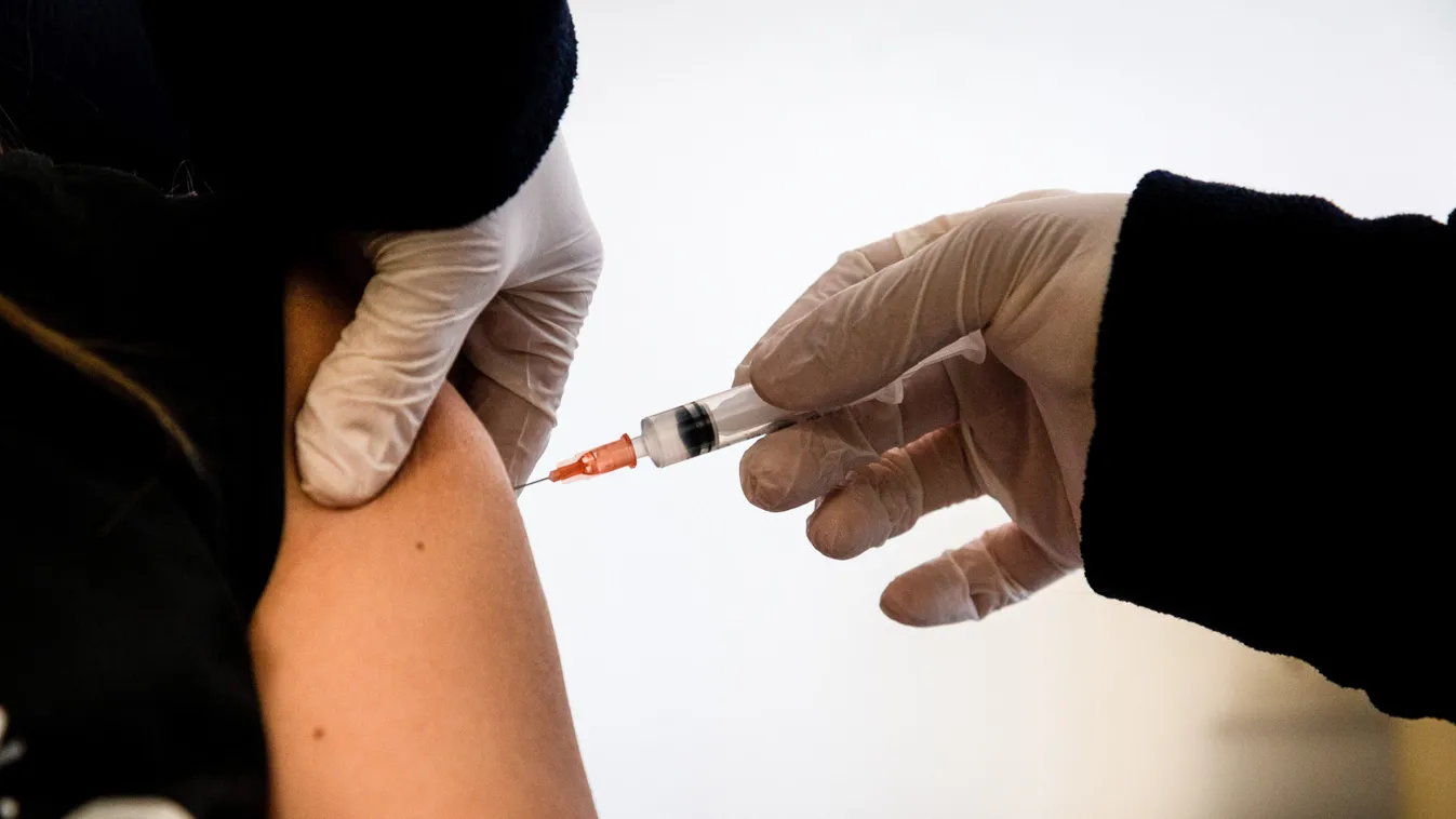A nurse injects China's Sinovac vaccine to a hospital staff