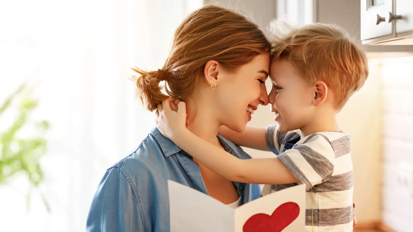 Happy,Little,Boy,Congratulating,Smiling,Mother,And,Giving,Card,With