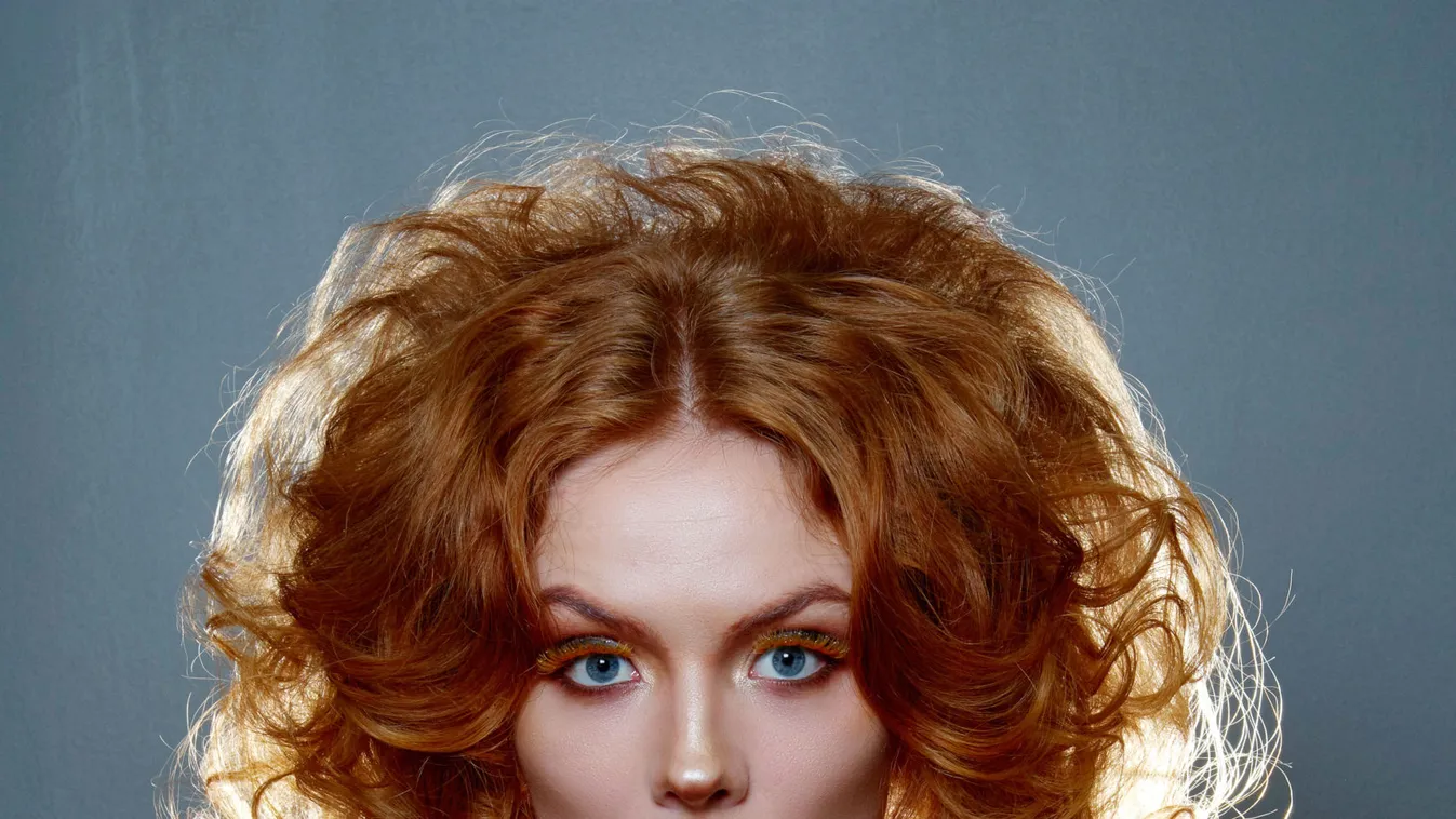 Girl,With,Red,Hair,,Creative,Makeup,And,Eyelashes,Beautiful,Hairstyle