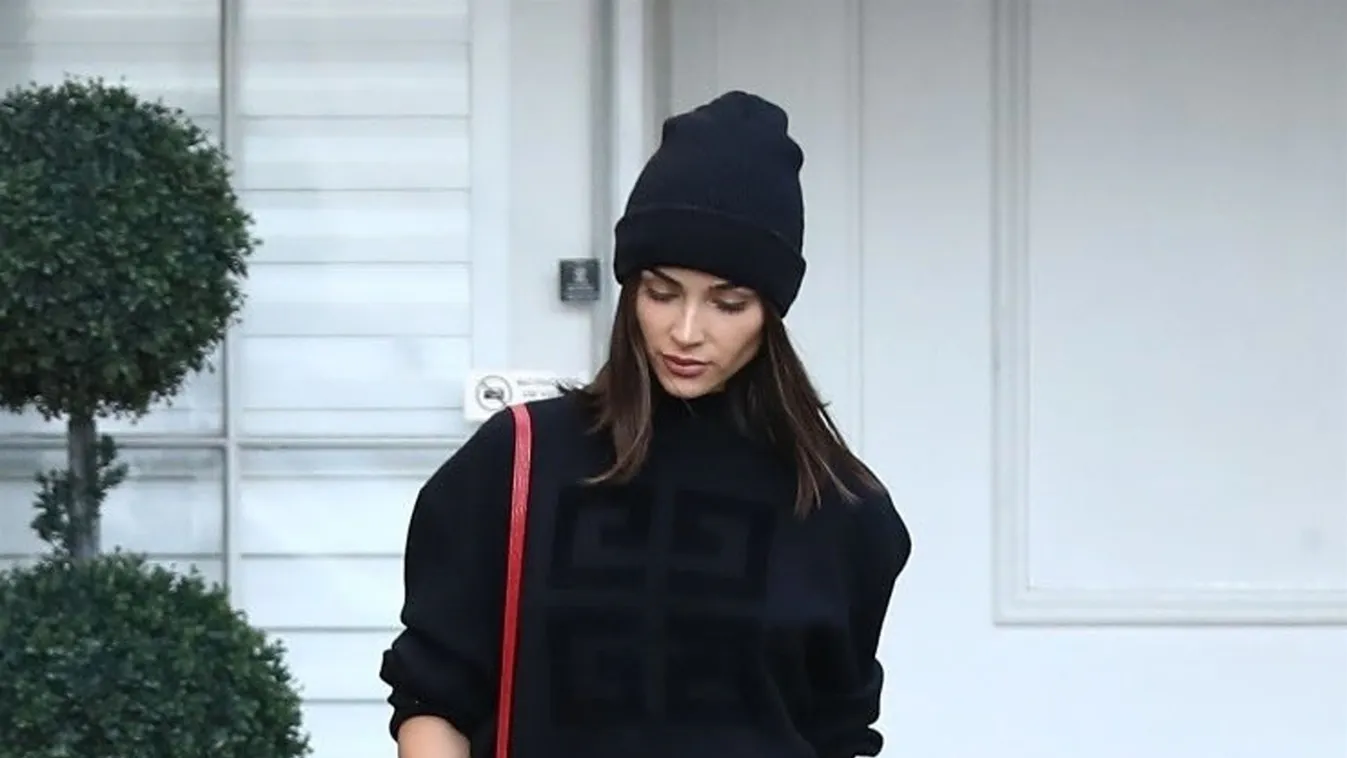 Olivia Culpo looks sexy in red knee high boots as she leaves Epione