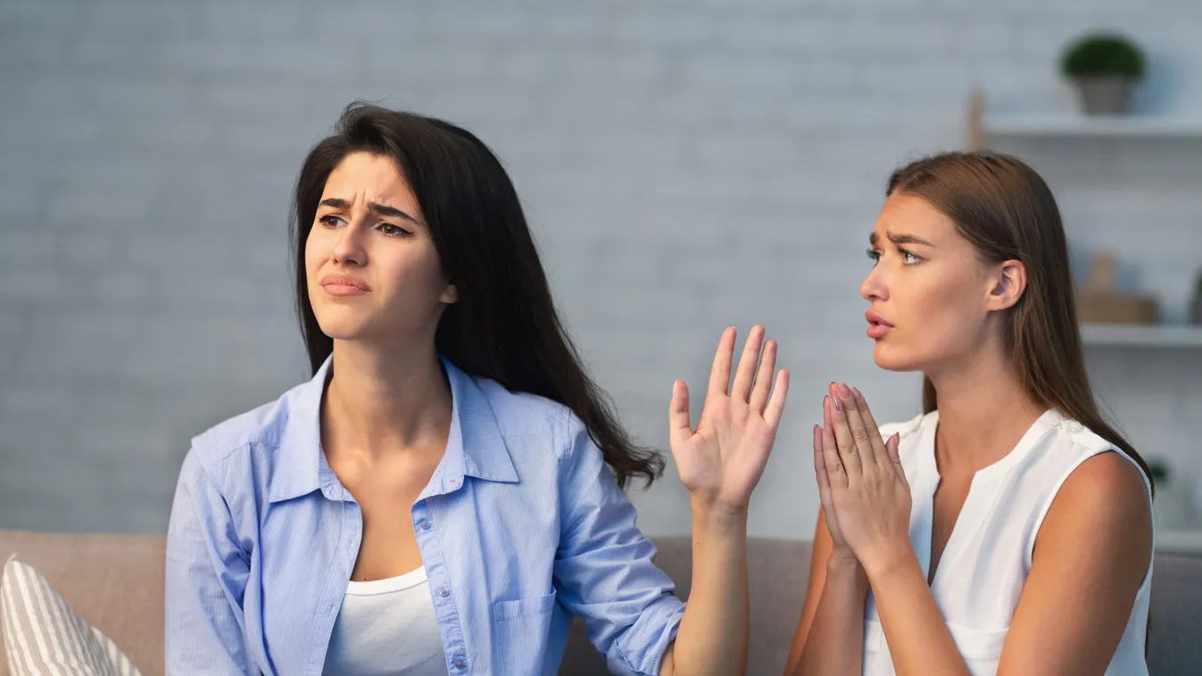 Miserable,Girl,Asking,Indifferent,Friend,For,A,Favor,Begging,Holding