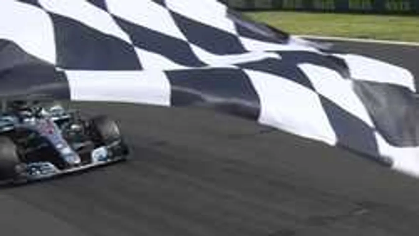 Vettel ért elsőként célba, de Hamilton nyert