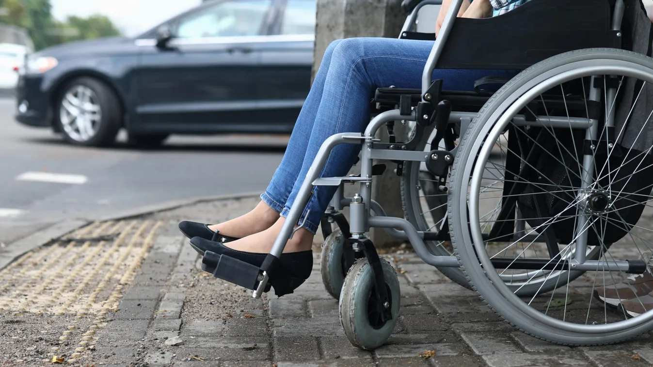 Female,Legs,In,Wheelchair,Close,Up.,Help,For,People,With