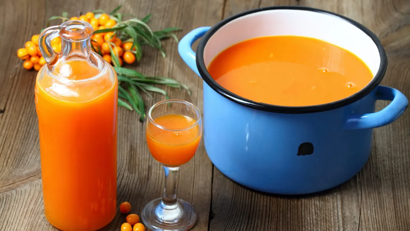 Homemade,Sea,Buck,Thorn,Liqueur,,Hippophae,Rhamnoides,,On,The,Wooden