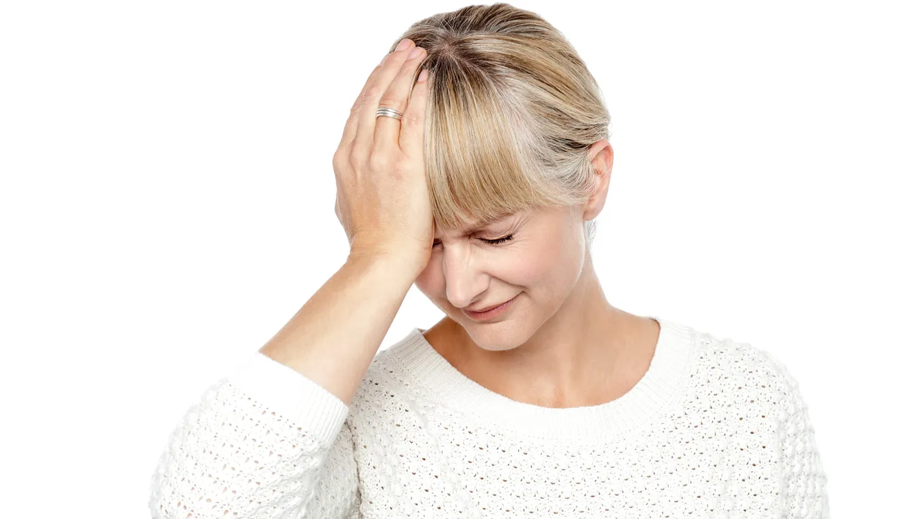 Sad middle aged woman suffering from headache