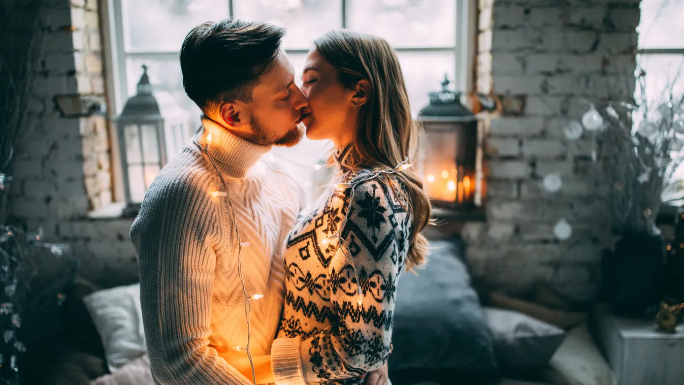 A,Guy,With,A,Girl,Is,Celebrating,Christmas.,A,Loving