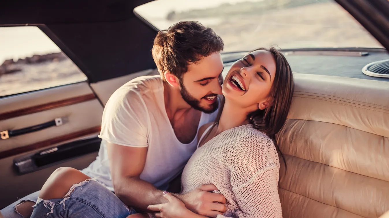 Romantic,Couple,Is,Sitting,In,Green,Retro,Car,On,The