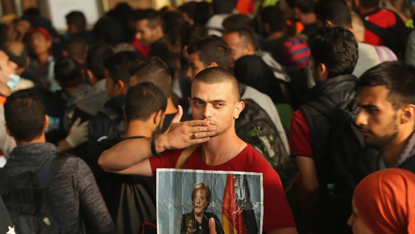 Migrants Arrive In Germany Following Ordeal In Hungary