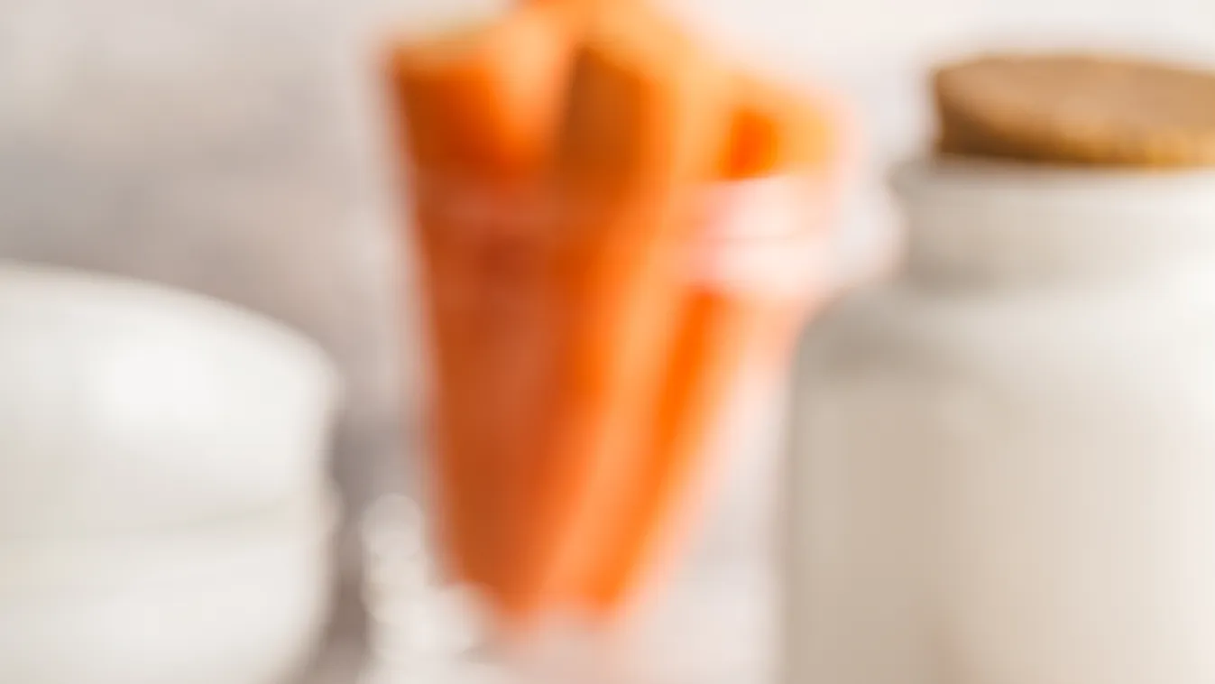 Vegan,Carrot,Cake,With,Coconut,Cream,And,Pecans,On,White