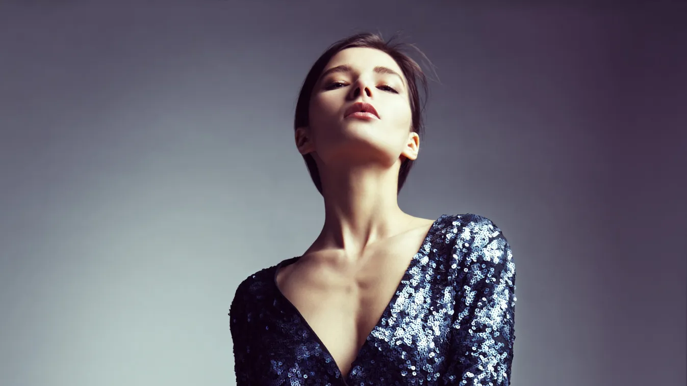 Beautiful woman in fashionable clothes