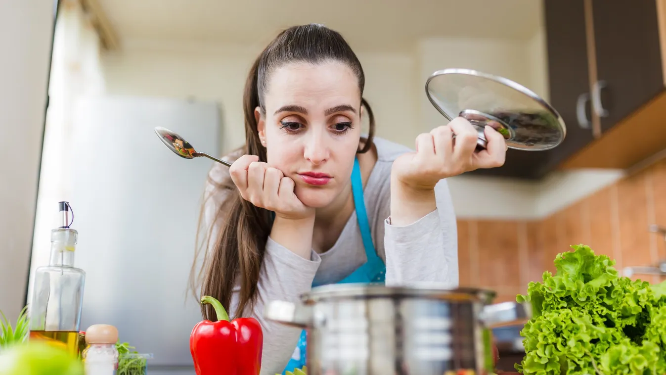 Unhappy,Woman,Looking,At,Pot,In,Kitchen.,Food,Preparing,Failure