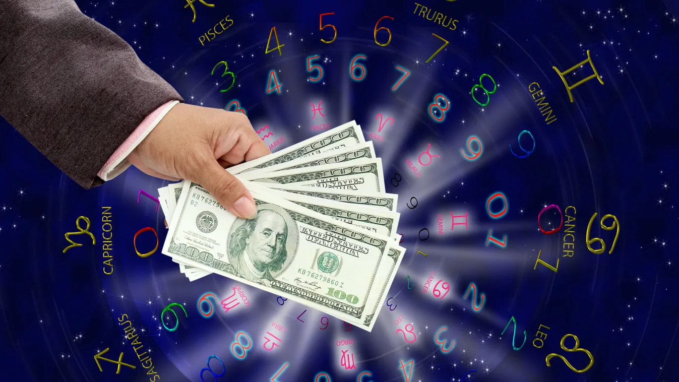 Hand,Holding,Money,On,Background,Of,Astrology,And,Fortune,Concept.