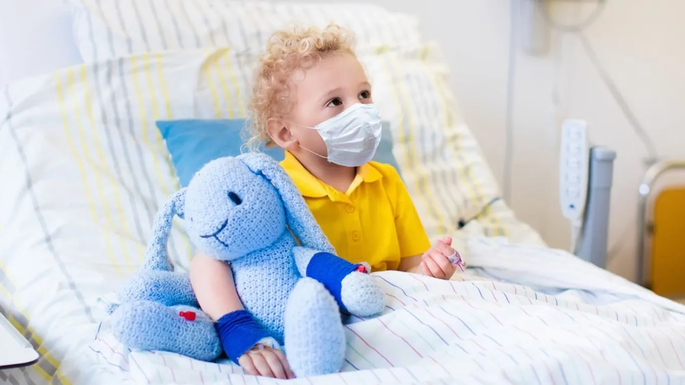 Little,Boy,Playing,Wearing,Face,Mask,With,His,Toy,In