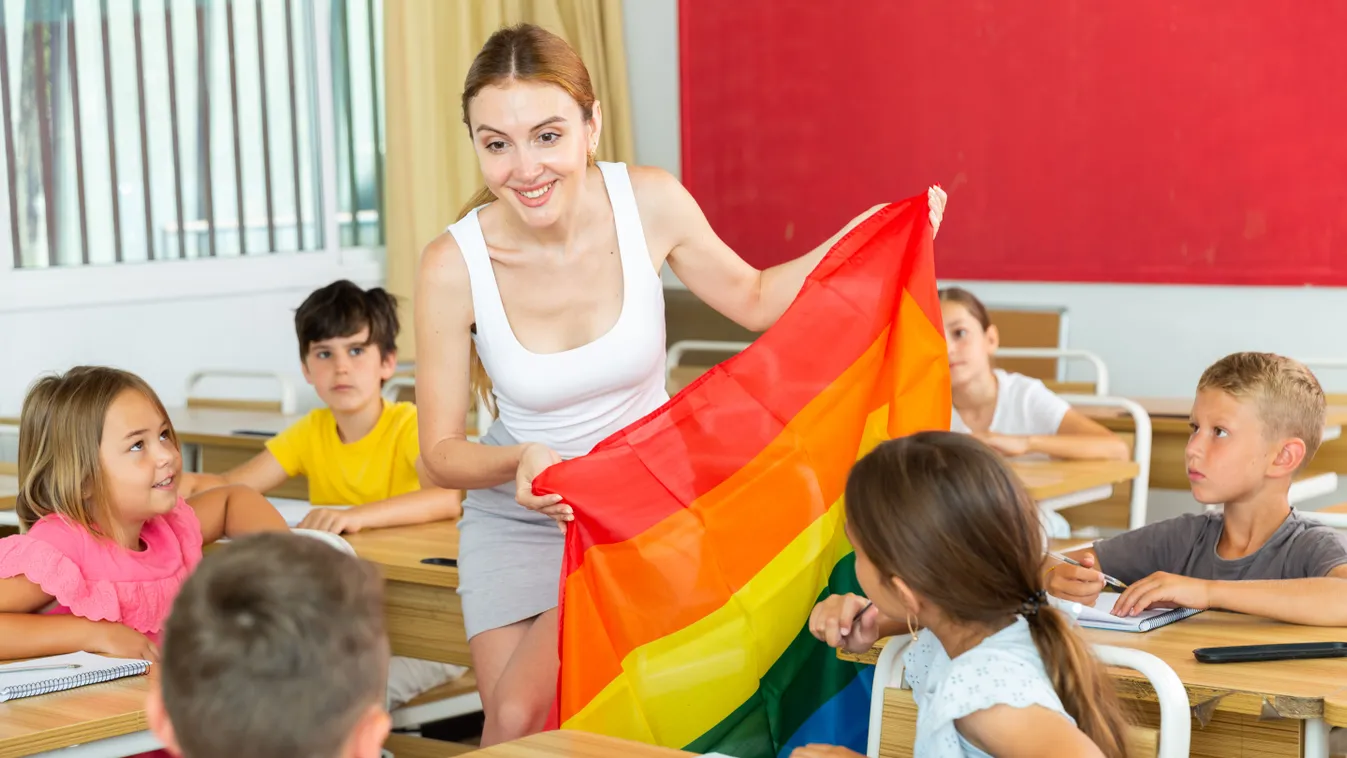 Young,Progressive,Female,Teacher,Discussing,With,Preteen,Children,About,Lgbt