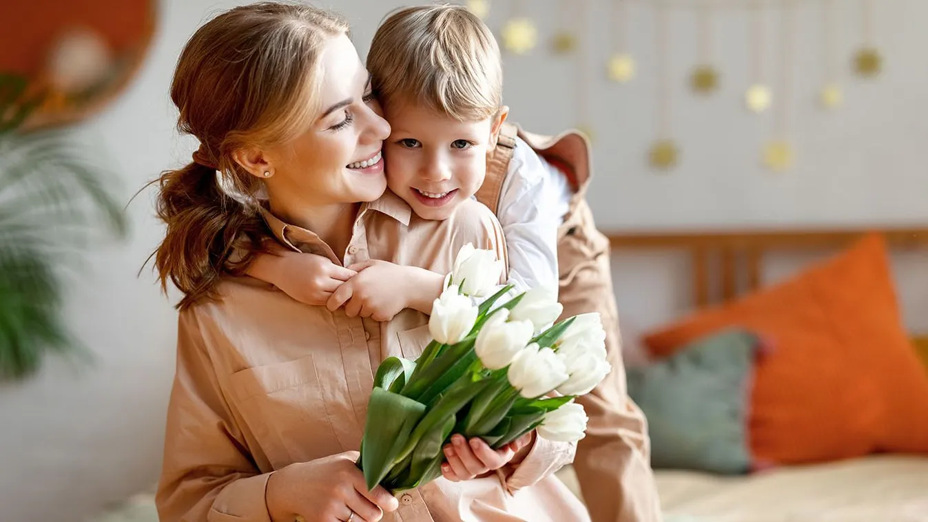 Happy,Mother,With,Tulips,Smiling,And,Embracing,Boy,In,Gratitude