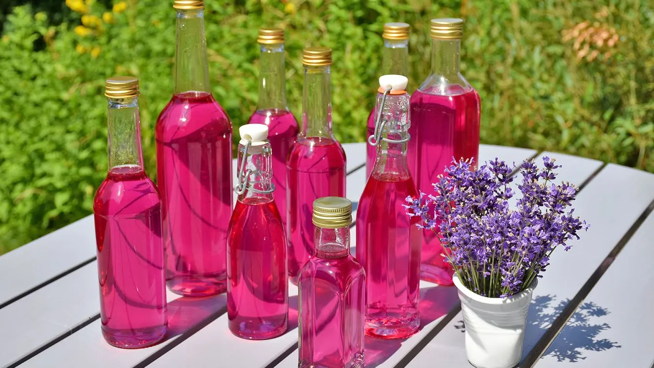 Homemade,Lavender,Syrup,In,Glass,Bottles,And,A,Bouquet,Of