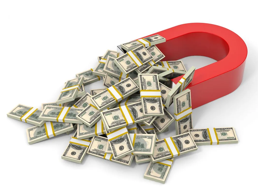 Magnet,On,White,Background,Attracts,Money,Dollars.,3d,Illustration.