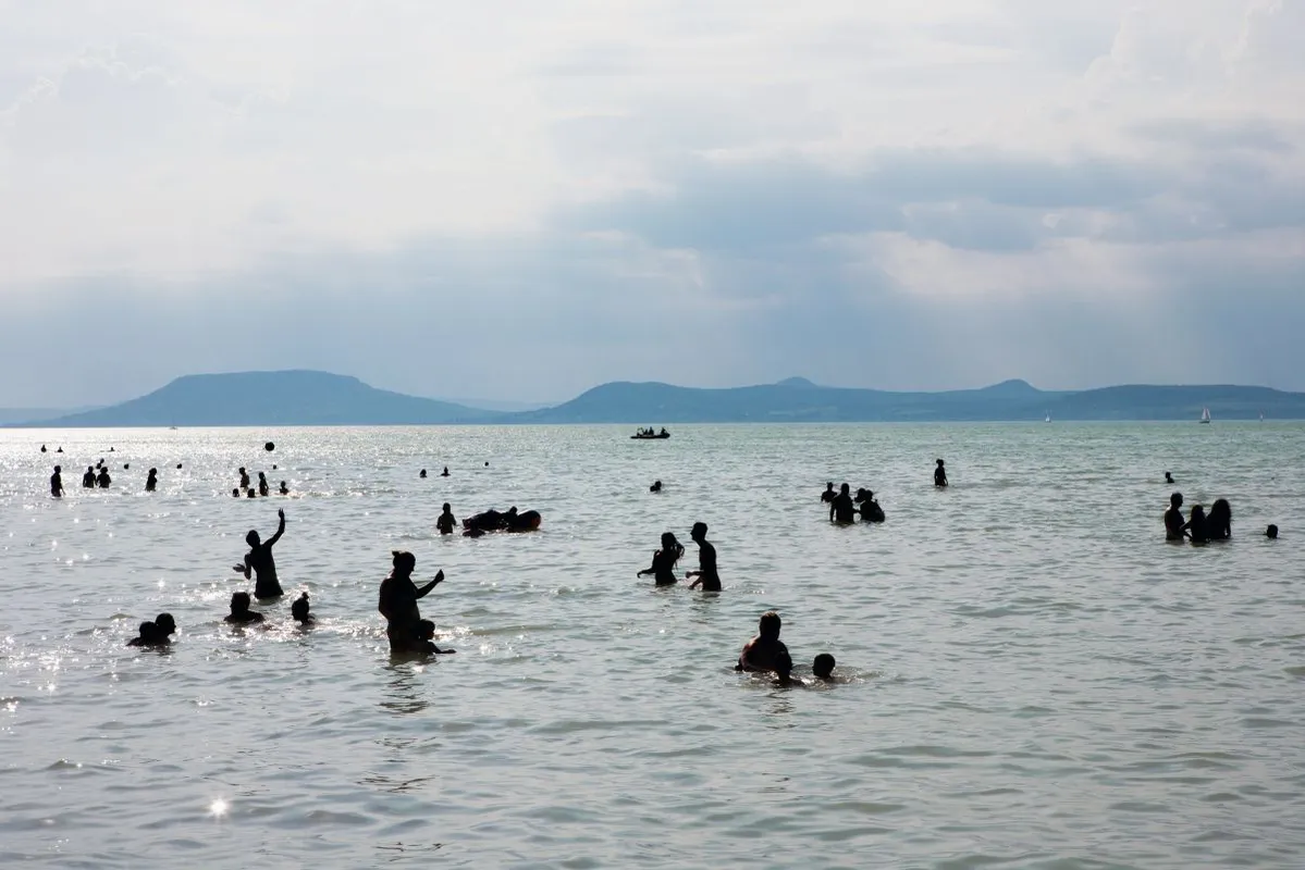 Bather's,Silhouettes,In,Lake,Balaton,,Hungary
