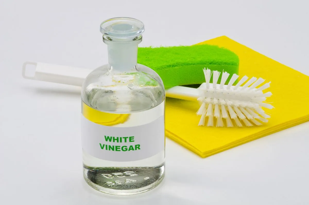 White,Vinegar,In,A,Glass,Bottle.,White,Background.,Organic,Cleaner.