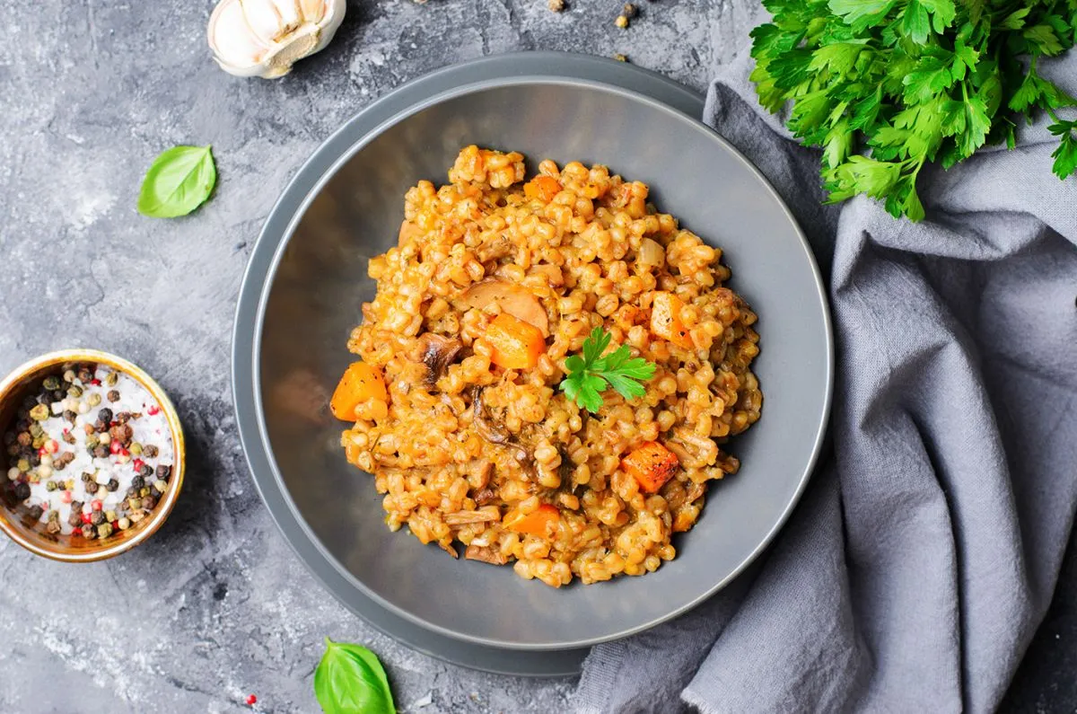Spelt,Pumpkin,Mushroom,Risotto,On,Grey,Background,,Tasty,Vegetarian,Meal