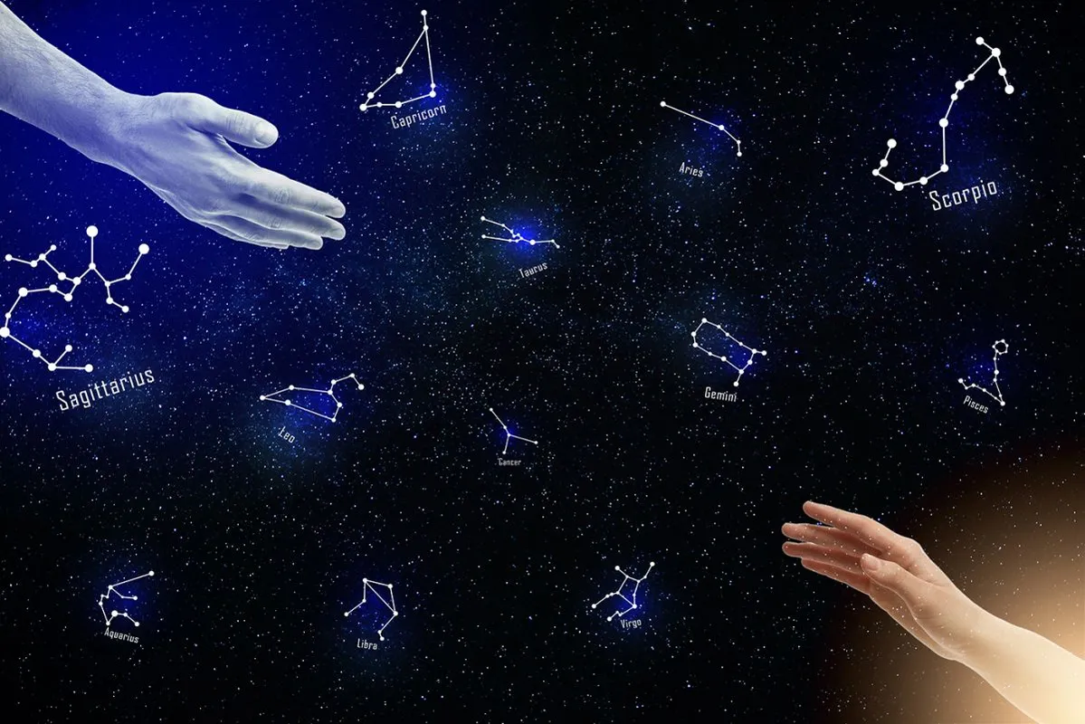 Zodiac,Compatibility.,Man,And,Woman,Reaching,Hands,To,Each,Other